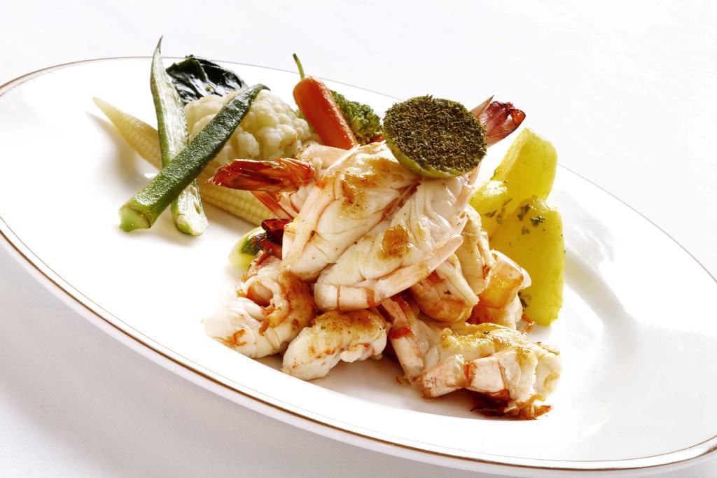 Heritage Madurai Exterior foto A prepared crab