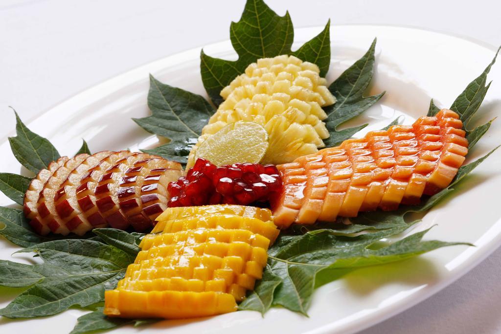 Heritage Madurai Exterior foto A plate of sashimi