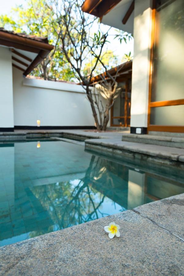 Heritage Madurai Exterior foto A swimming pool at a private residence in Bangalore, India